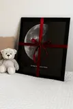 Customer holding their star map print