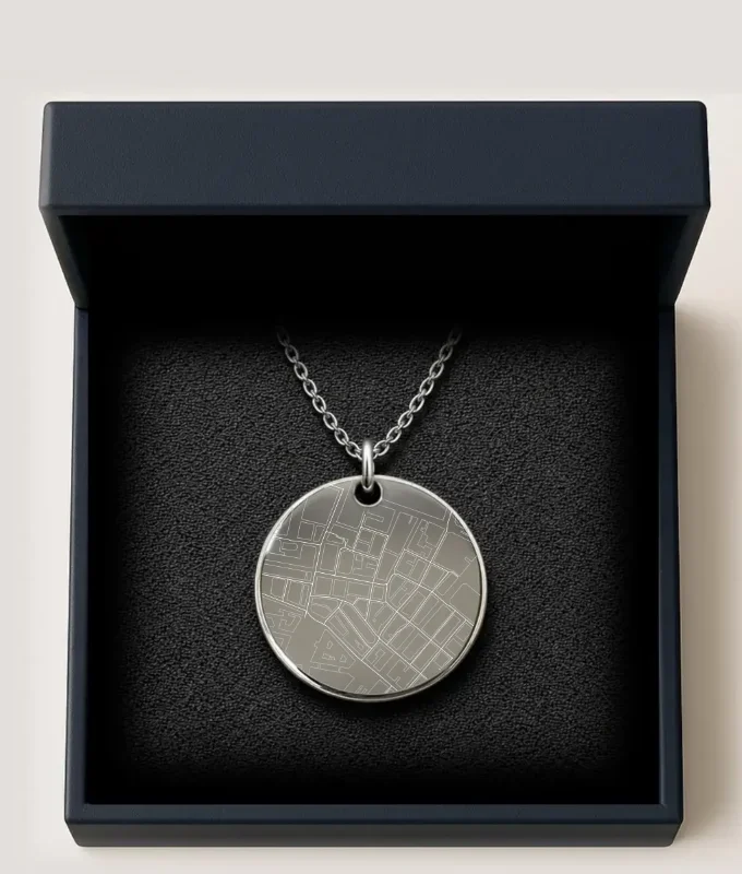 Preview of an engraved location map pendant in a gift box