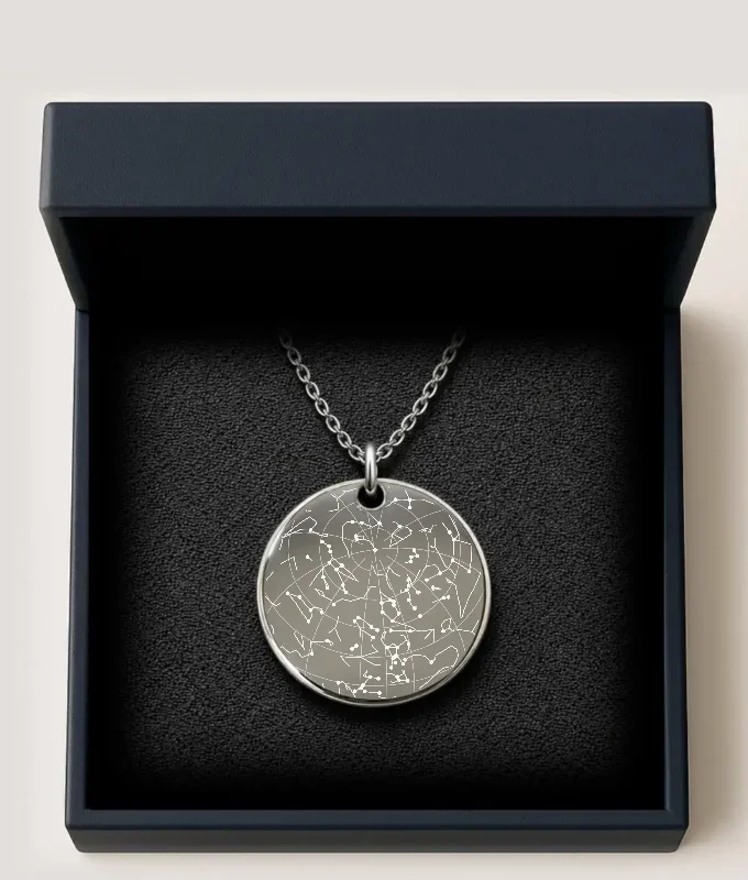 Preview of an engraved star map pendant in a gift box