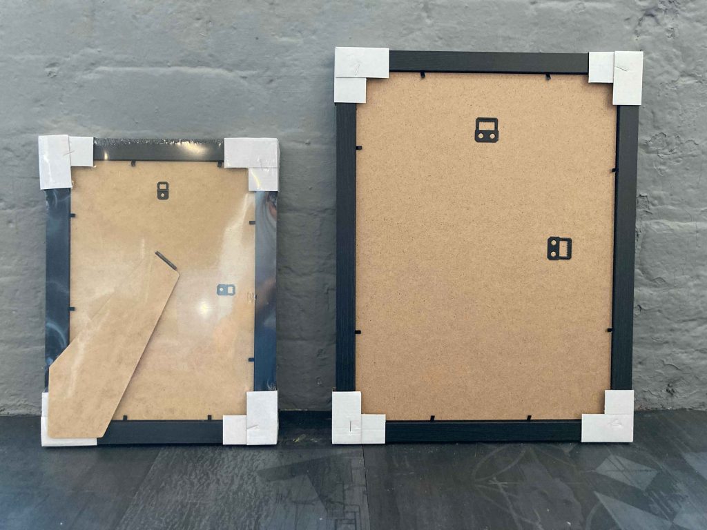 A picture to show the back attachment for wall hanging, or a strut for self standing.