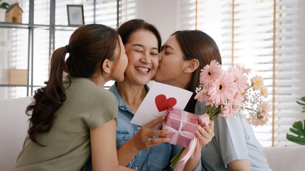 Mother holding flowers on Mother's Day