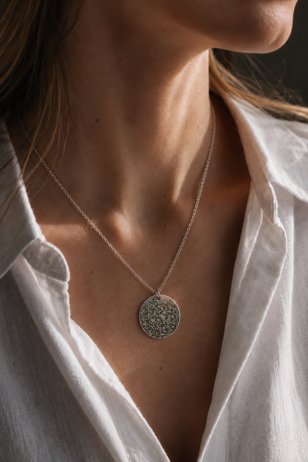 Star map necklace worn